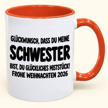 GLÜCKWUNSCH, DASS DU MEINE SCHWESTER BIST, DU GLÜCKLICHES MISTSTÜCK! - Lustige Weihnachten 2026 - Zweifarbige Kaffeetasse als Geschenk MUGDEU (SKU2610-778)